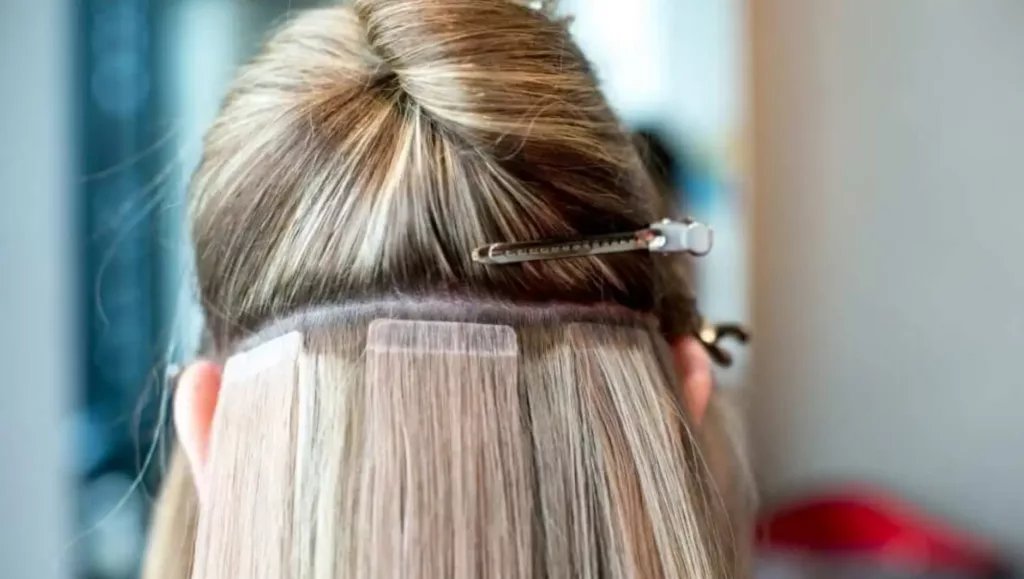 how to use tape in hair extensions like a pro2