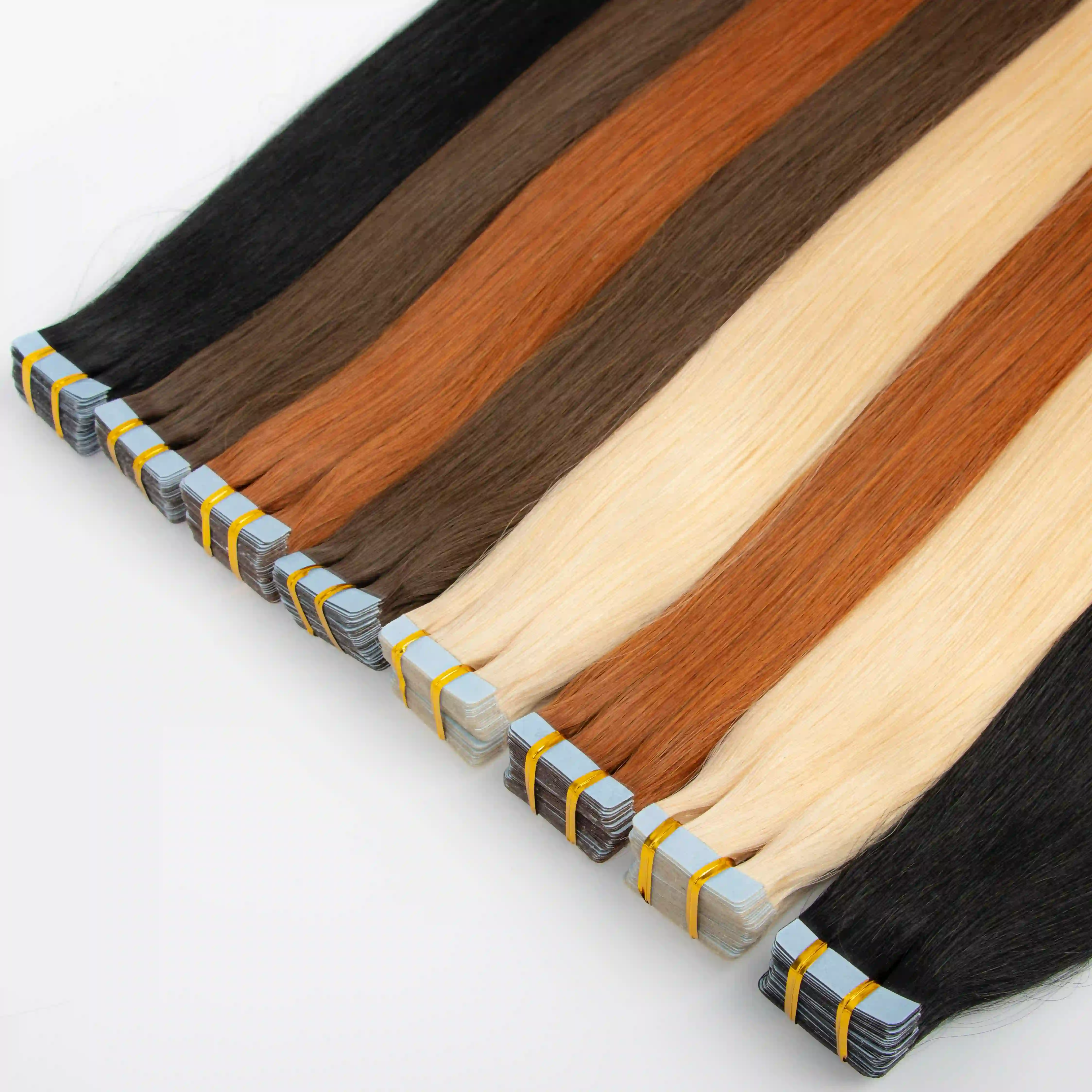 Tape in hair extension product close-up showing adhesive tabs and straight human hair