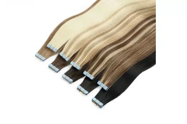 Tape in extension shade samples arranged for a salon color comparison