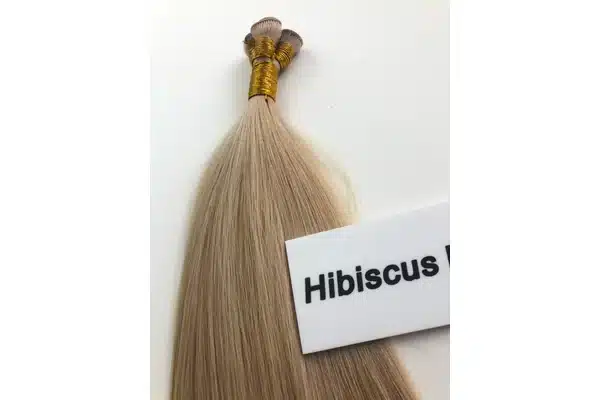 Close-up hand tied weft hair extensions showing product construction details