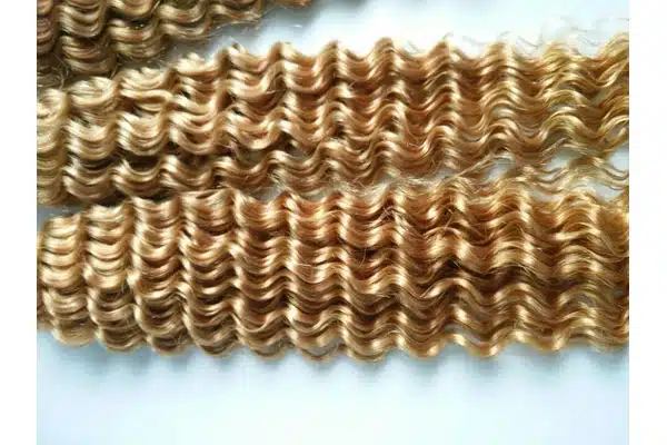 Keratin hair extension strands prepared for a salon pricing consultation