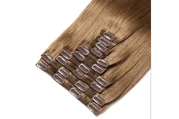 Light brown clip in extension pieces arranged with different widths and visible clips.