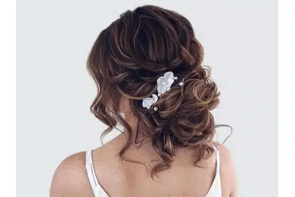 Loose updo inspiration showing the side and nape areas that need a tab check.